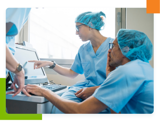 surgeons using laptop