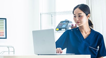 nurse on laptop