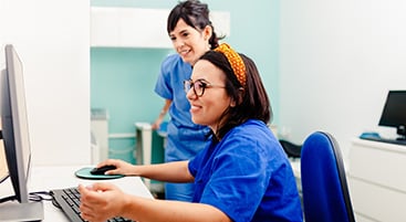 nurses on computer