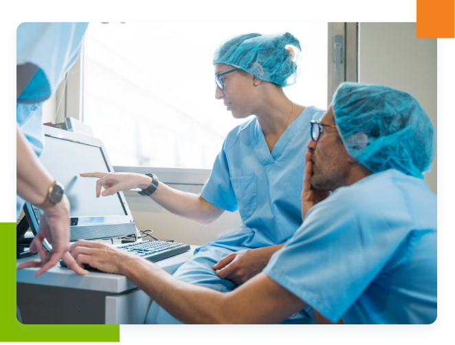 surgeons using laptop